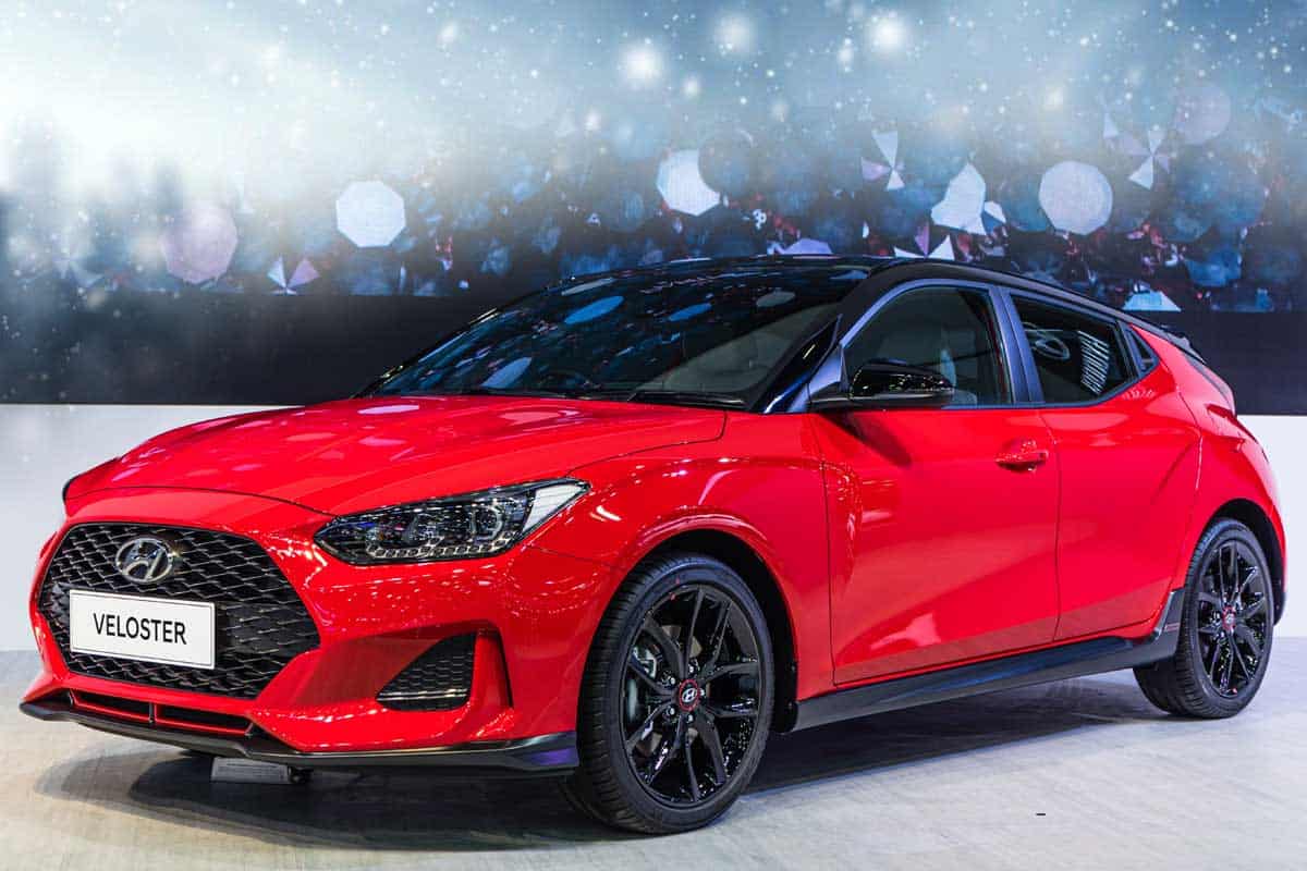 A Red Hyundai Veloster on display at motor expo, How Is The Hyundai Veloster In The Snow?