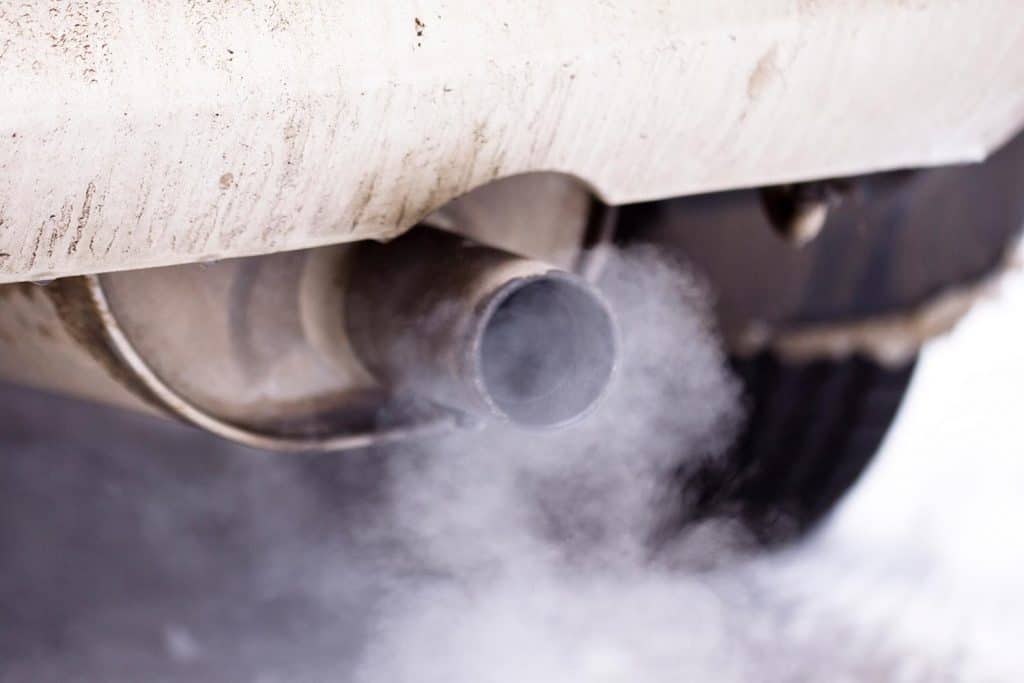 Smoke in the exhaust pipe of a car