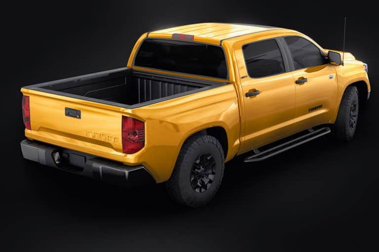 Toyota Tundra 2020 full size pickup yellow truck isolated on black background, Will A King Size Bed Fit In The Bed Of A Truck?