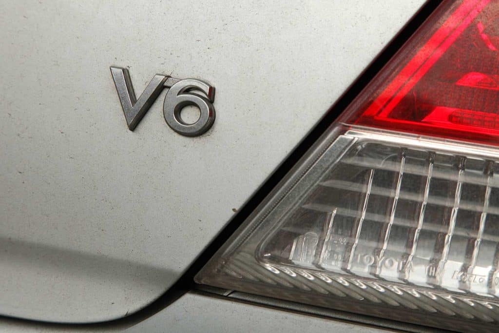 V6 sign on the rear of a Toyota Camry