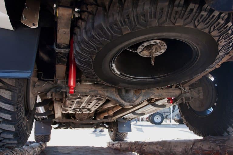 View from the bottom of a truck with a spare tire, How To Remove A Spare Tire From A Truck - Even Without An Extension Rod