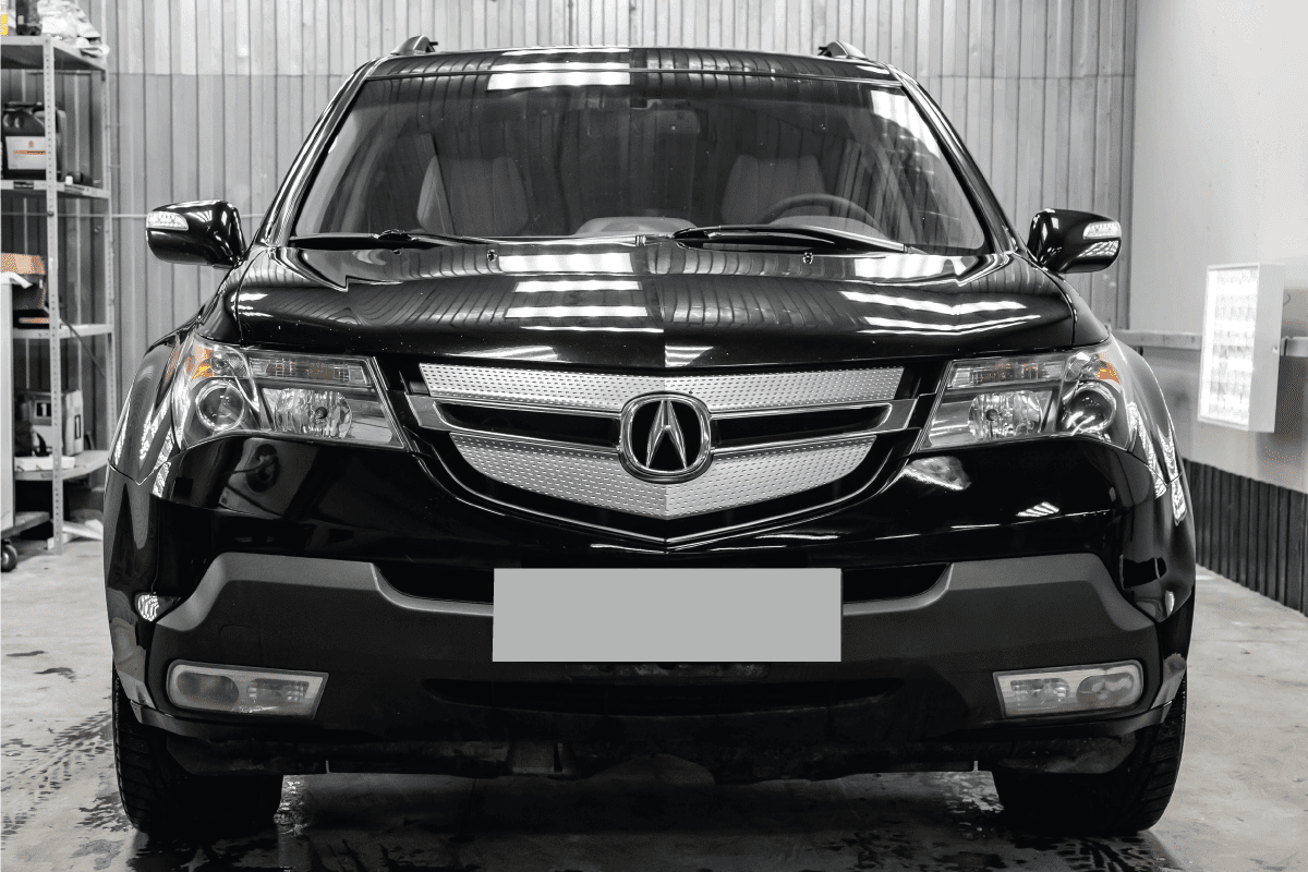 cura MDX 2008 year black color with headlights standing in the light service box of the detailing workshop. Acura MDX Won't Start—What Could Be Wrong