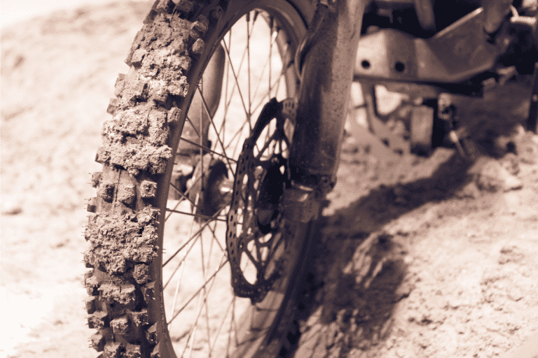 muddy Bike front wheel. Do Knobby Tires Last Longer
