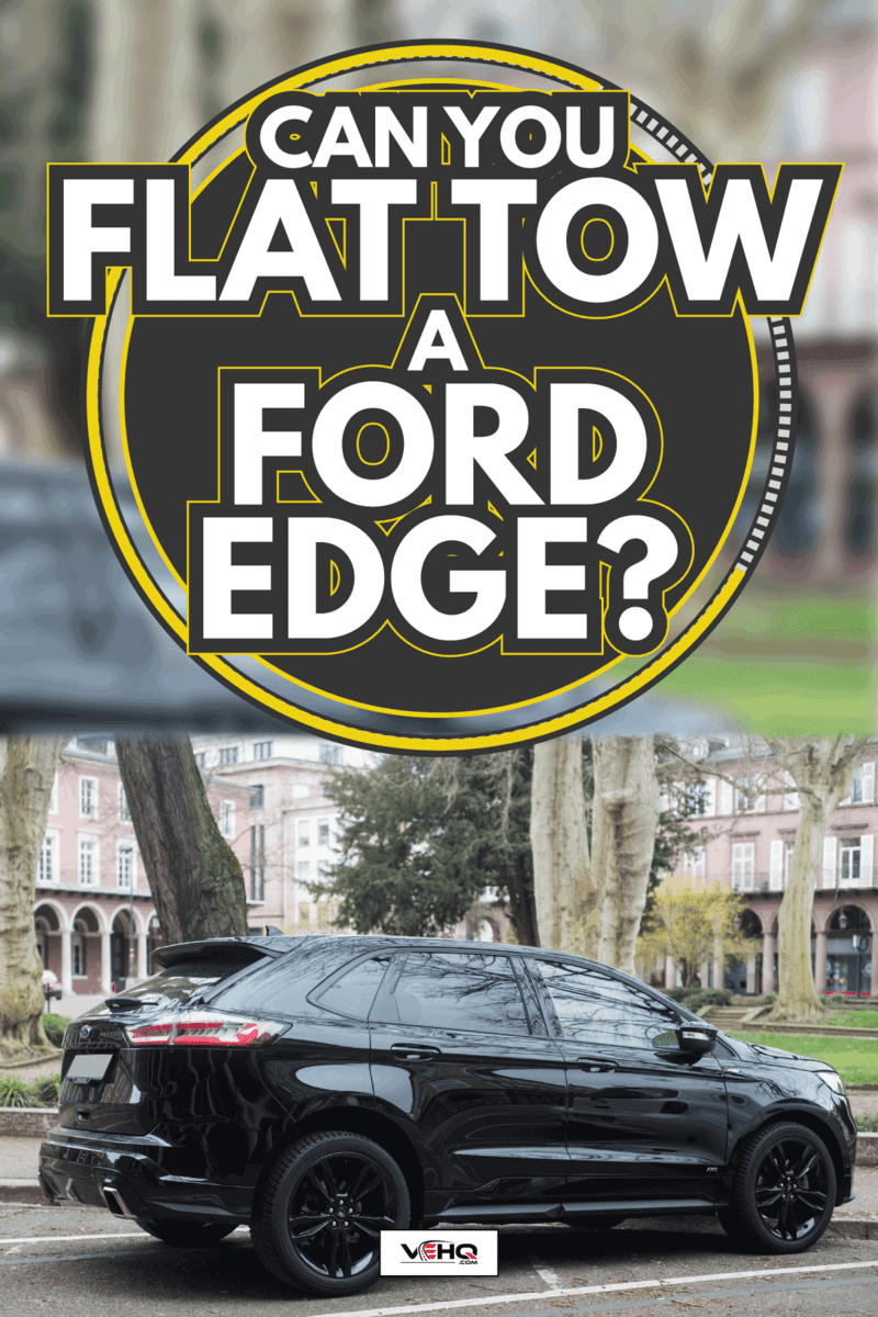 rear view of black Ford Edge parked in the street. Can You Flat Tow A Ford Edge