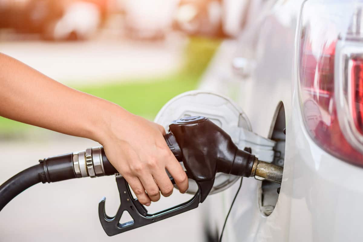 woman-pumping-gasoline-fuel-car-gas