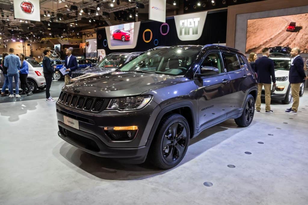 A black Jeep Compass displayed at the car show