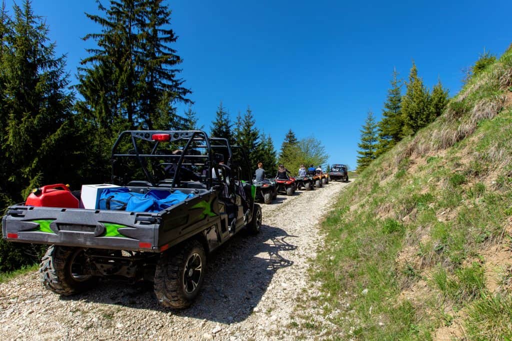 ATVs and UTVs trekking on a steep mountain
