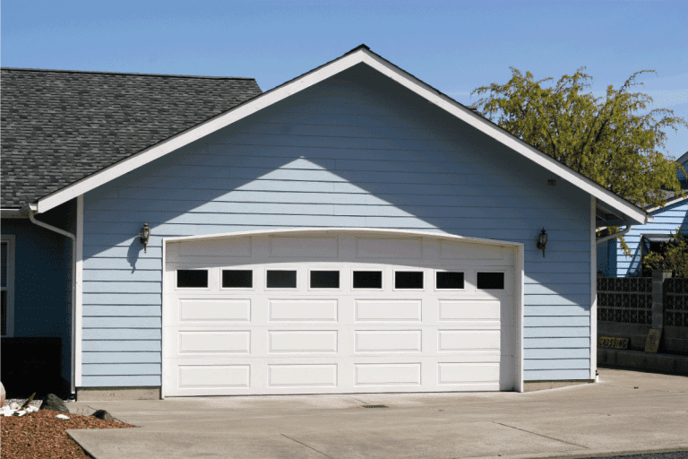Arched garage door opening on new residence. What's The Right Garage Door Size For A Truck [Full-Size And Midsize]