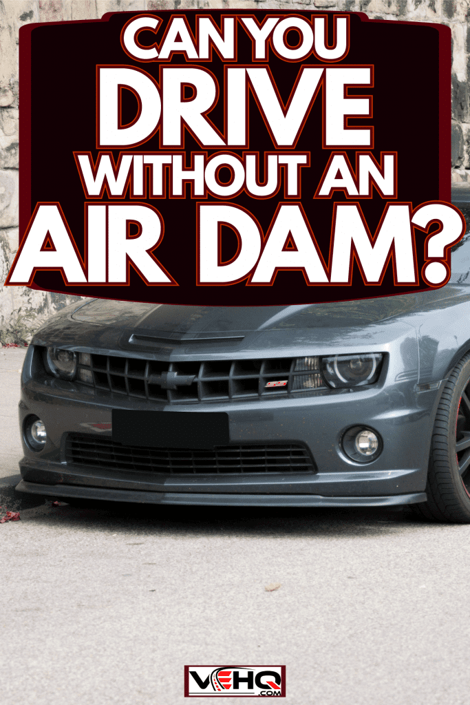 A Chevy Camaro parked on the side of the street, Can You Drive Without An Air Dam?