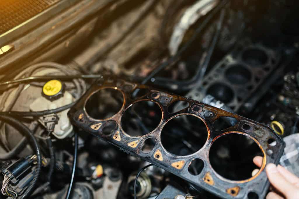 Dirty and oiled up head gasket due to a small leak