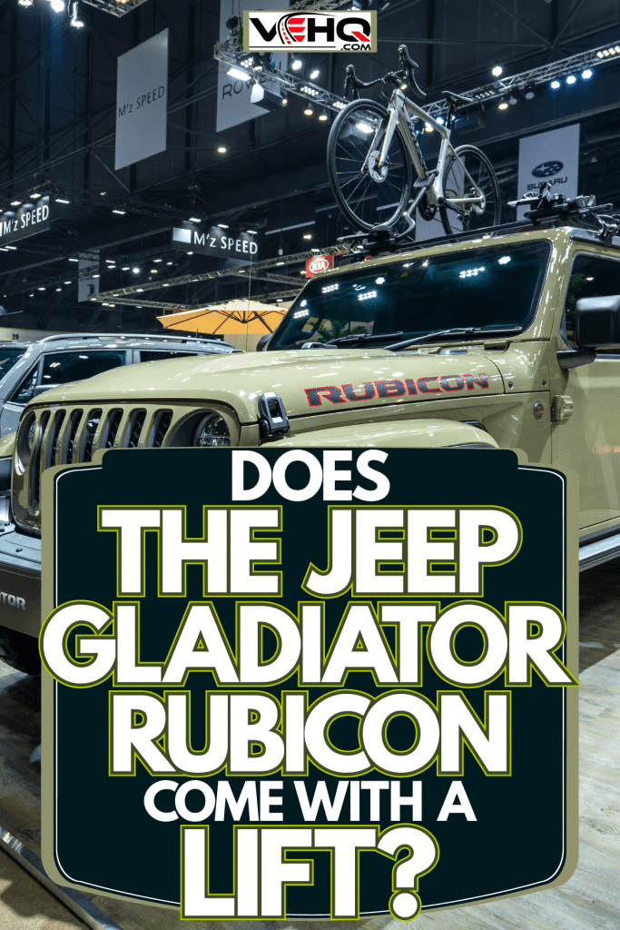 An army green Jeep Gladiator displayed at a car show, Does the Jeep Gladiator Rubicon Come with a Lift?