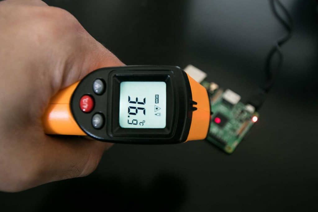 Infrared thermometer, with laser point, measures the chipset temperature of a single board