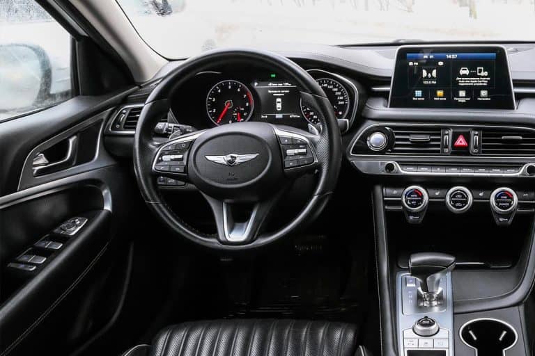 Interior of the compact saloon car Genesis G70, How To Activate And Use Launch Control On Genesis G70