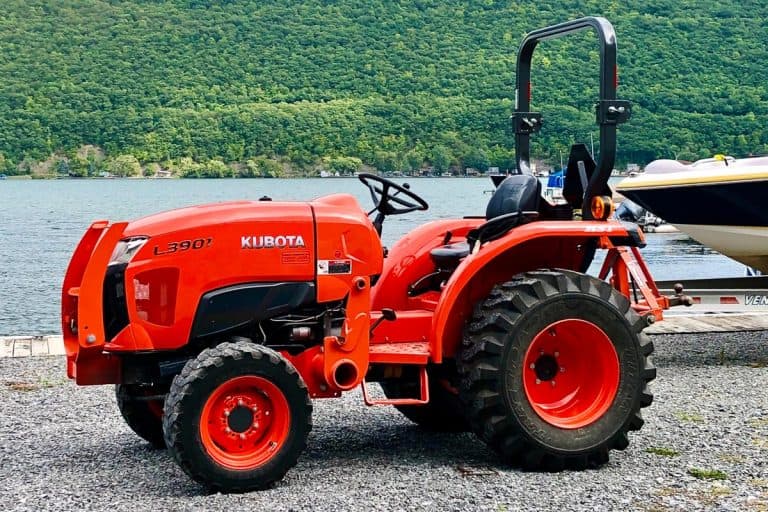 A KUBOTA diesel tractor near the lake, Kubota Tractor Won't Start Just Clicks - What Could Be Wrong?