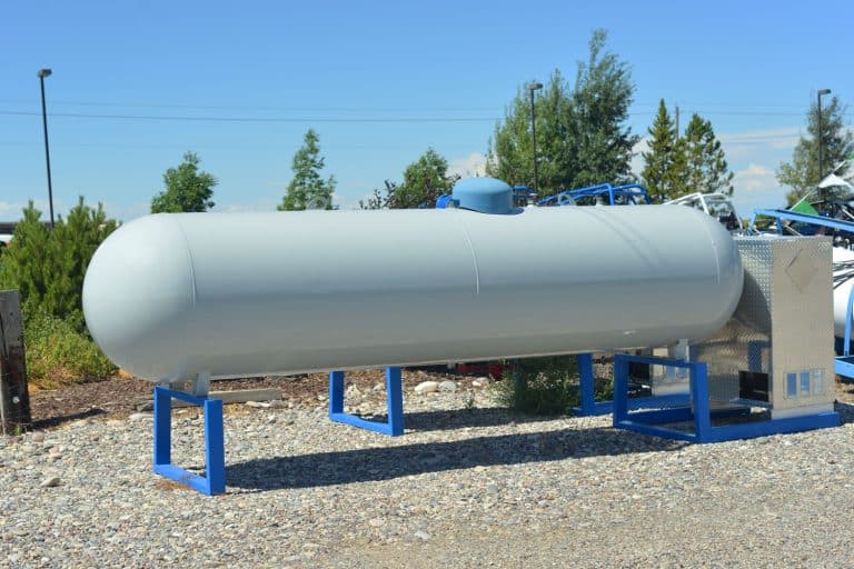 Large white portable propane tank stores pressurized fuel, Can A Truck Run on Propane?