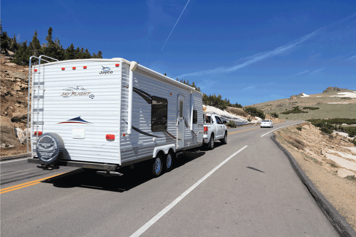 People drive with camping trailer along Trail Ridge Road in Rocky Mountain National Park. How Long Do Jayco Trailers Last