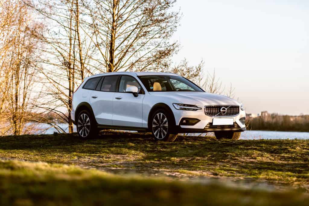 Riga,Latvia 27 April 2019 VOLVO V60 Cross Country Second generation 2019, natural landscape , off-road by river and sunset mood