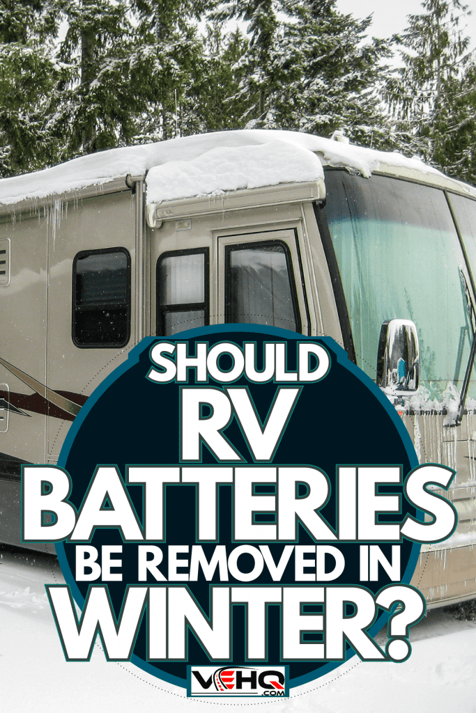 A class A motorhome covered in snow at the camping ground of a Ski park, Should RV Batteries Be Removed In Winter?