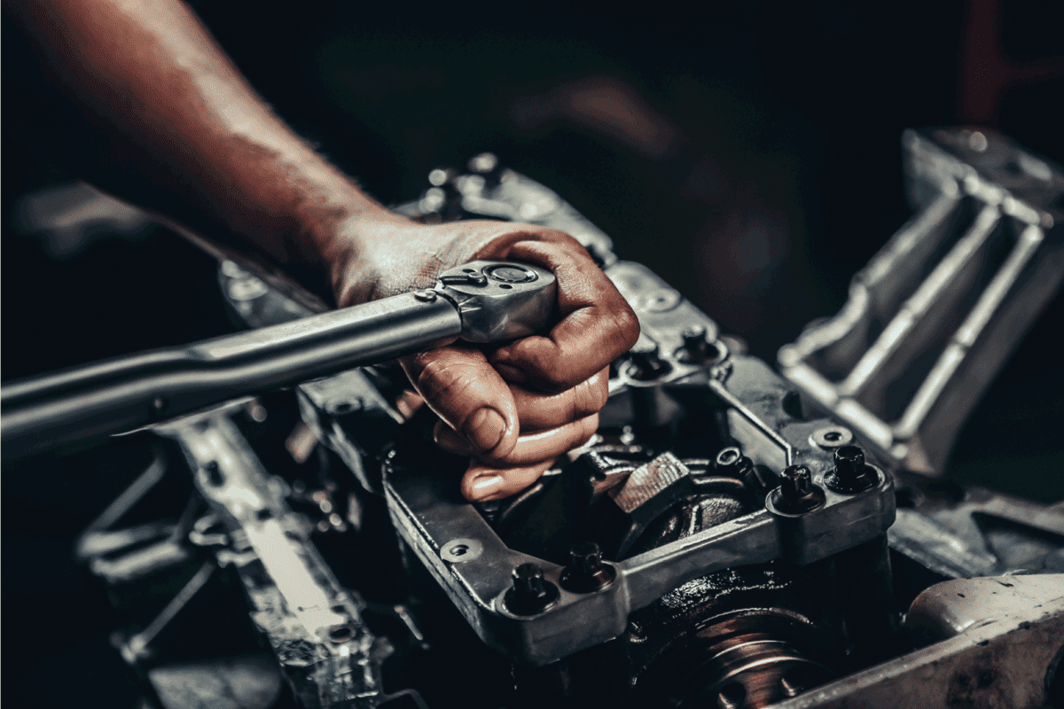 V8 Car Engine Repair using torque wrench