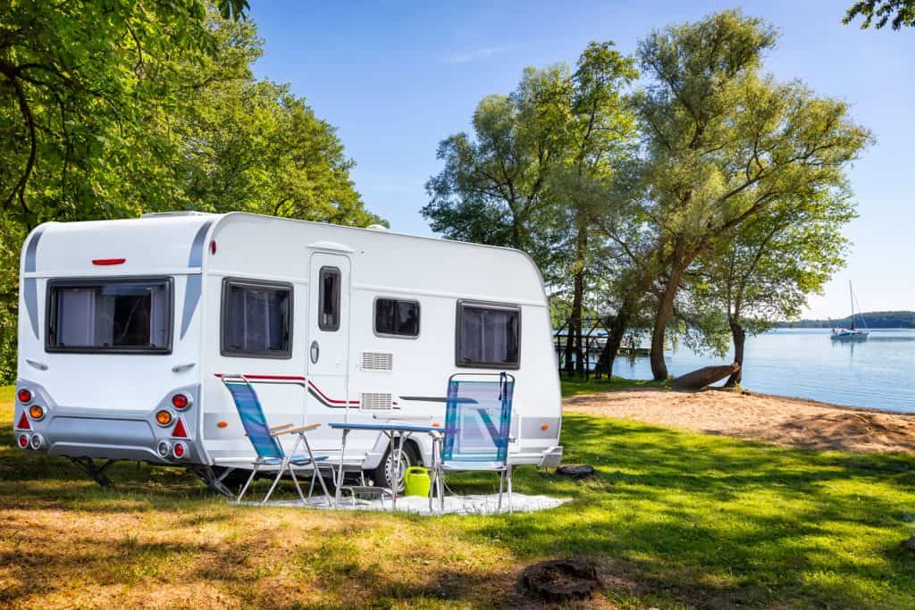Vacations in Poland - Camper trailer on the shore of bay of the Drawsko lake