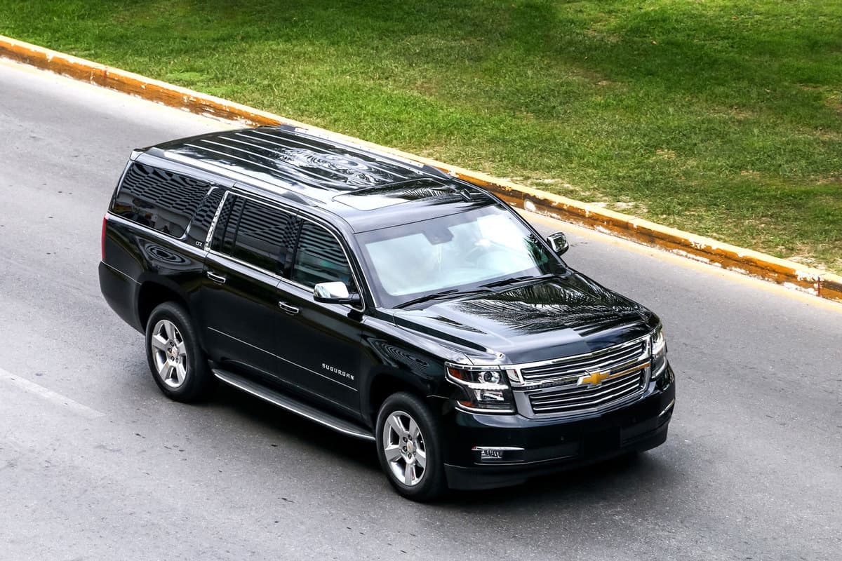 A black Chevrolet Suburban moving on the city streets