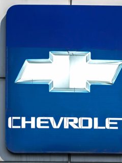 A blue LED signage of the Company Chevrolet, How Many Miles Can A Chevy Suburban Last?