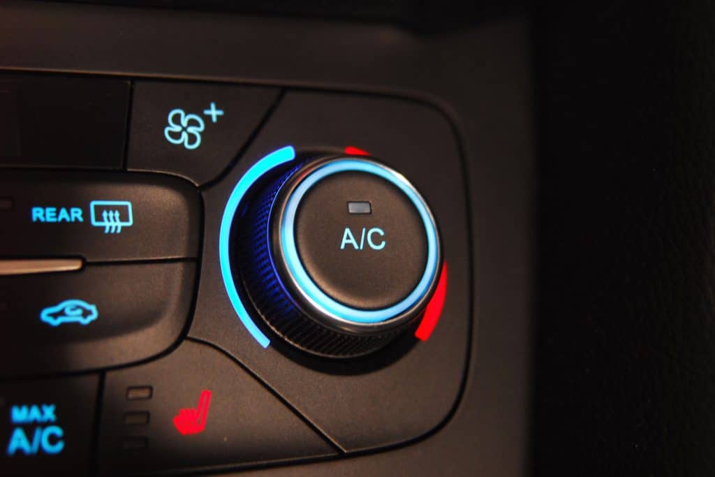 A car air conditioning turned on a white neon light indicator