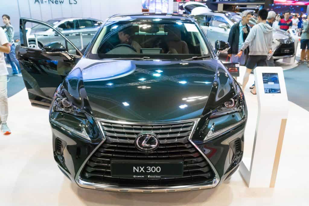 A dark gray colored Lexus NX300 displayed at a car show