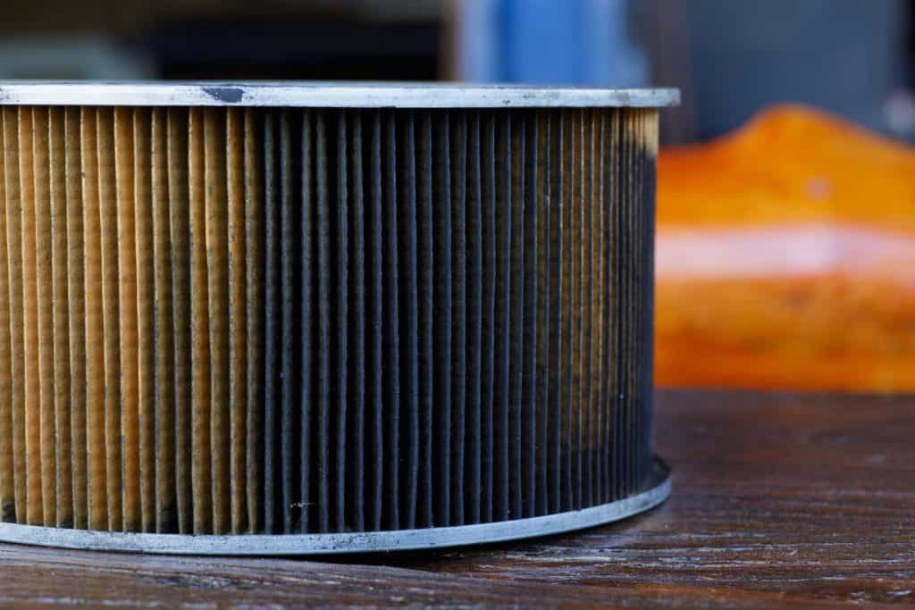 A dirty and old car air filter