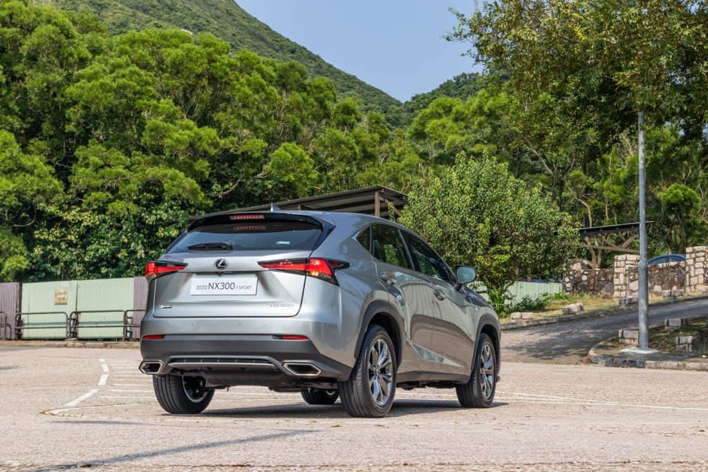 A gray Lexus NX300 parked on the side of the road