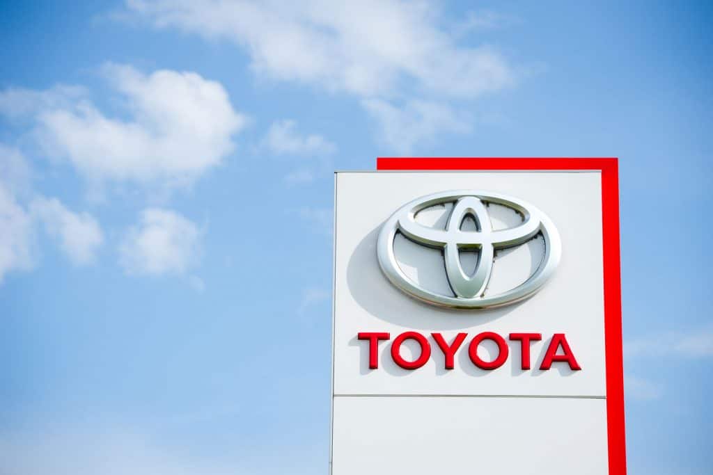 A tall Toyota signage photographed on a sunny day