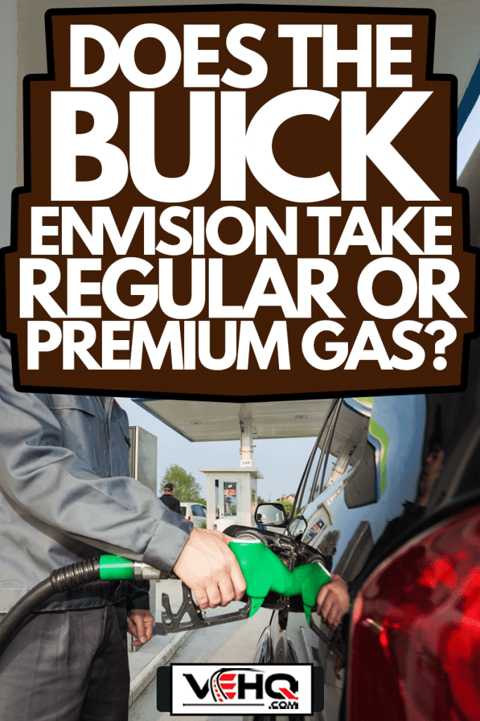 Gas station assistant refueling a car, Does The Buick Envision Take Regular or Premium Gas?