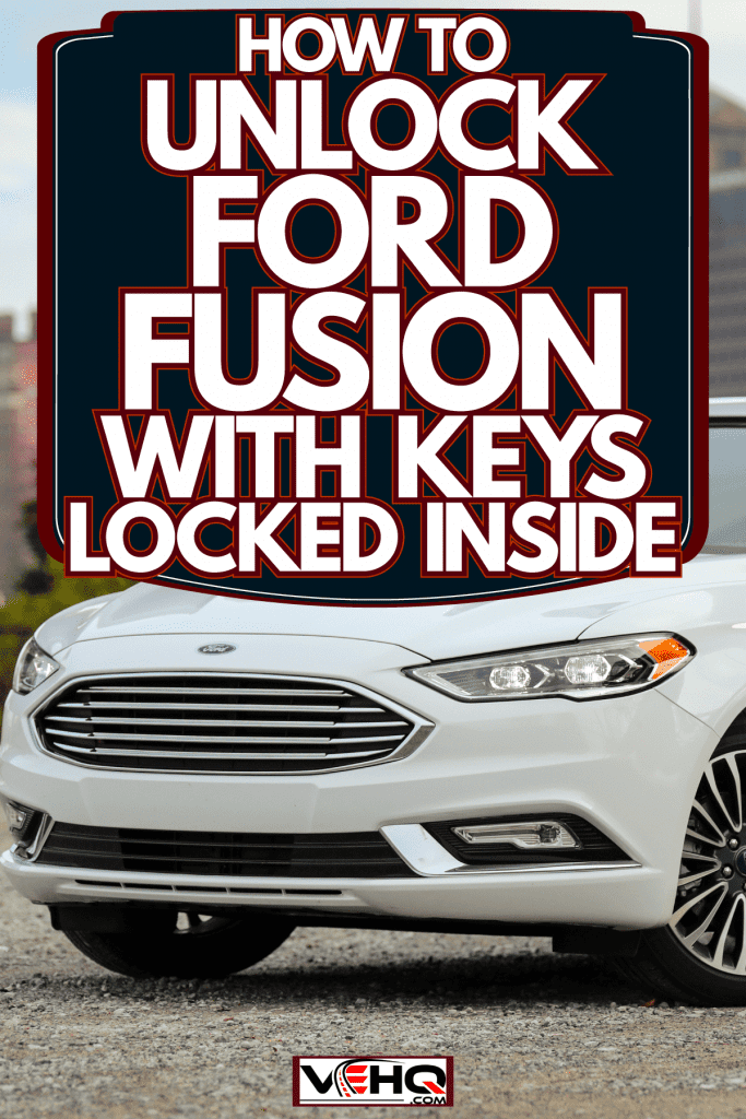 A sleek and white Ford Fusion photographed on a park, How To Unlock Ford Fusion With Keys Locked Inside