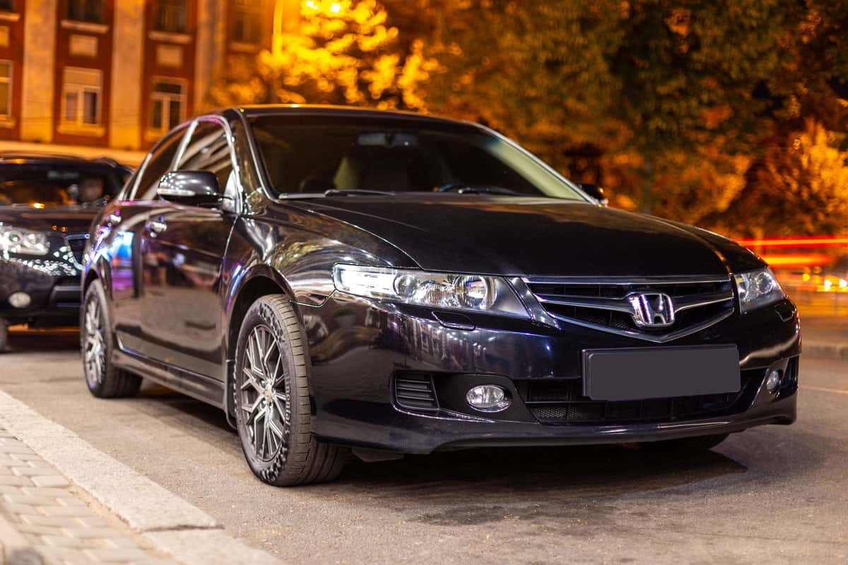 Photo of black Honda Accord on the street night time