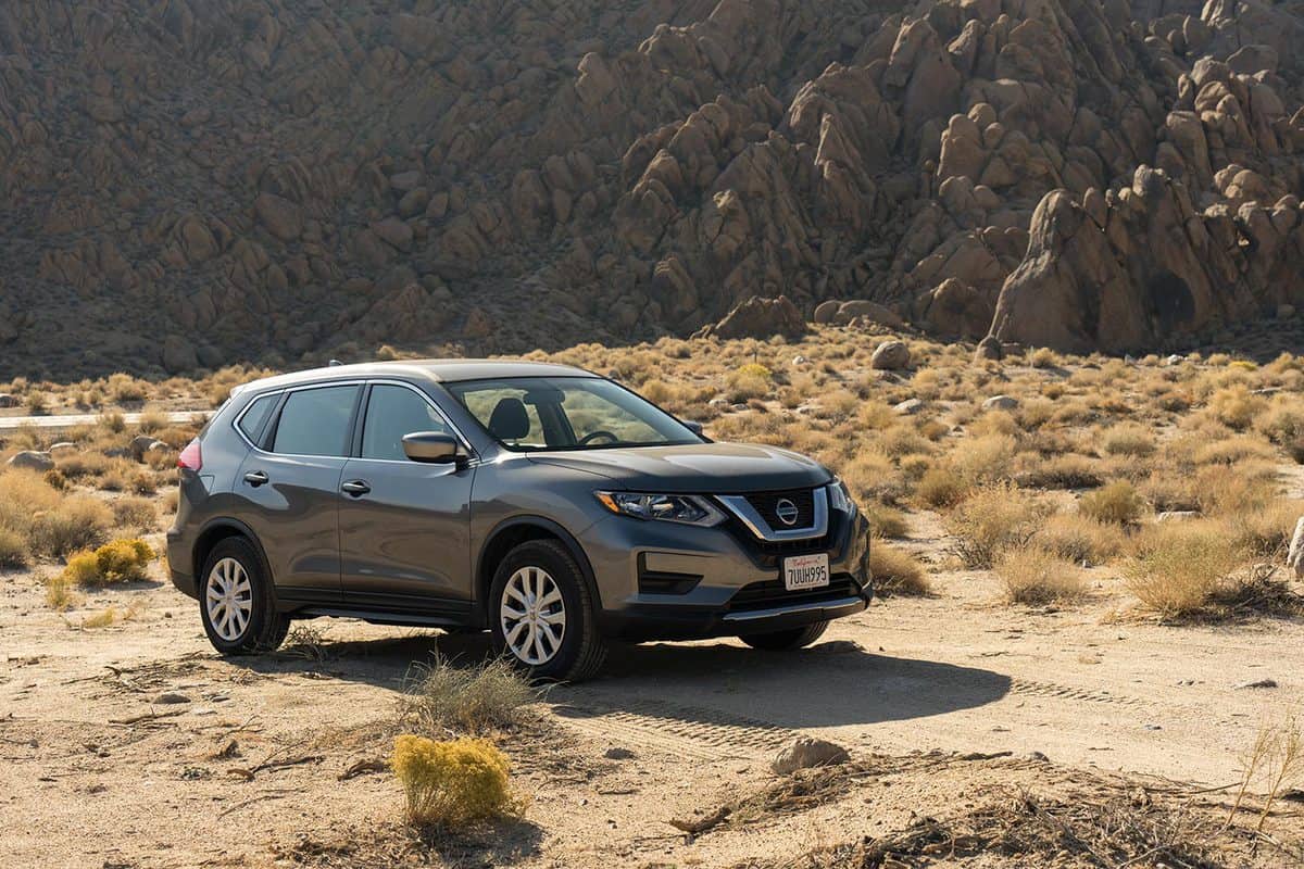 View of a grey 2017 Nissan Rogue in the desert