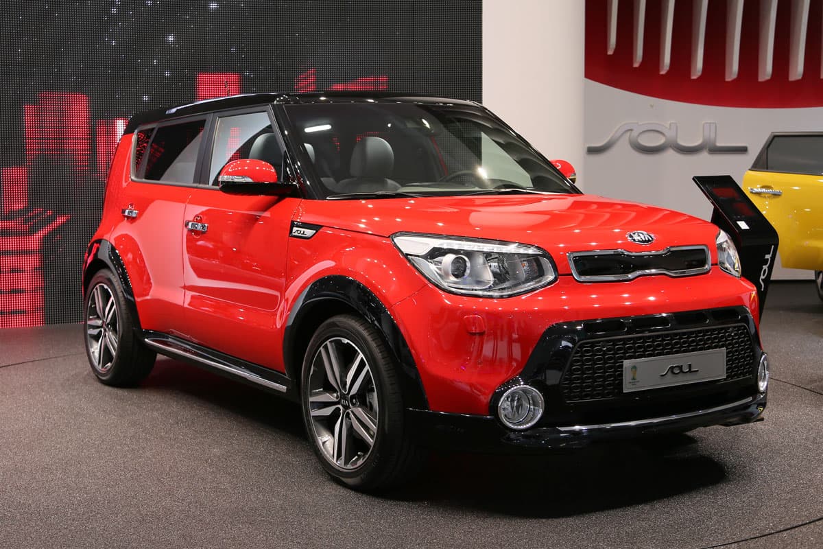 brand new red glossy Kia Soul car vehicle on the dealer showroom