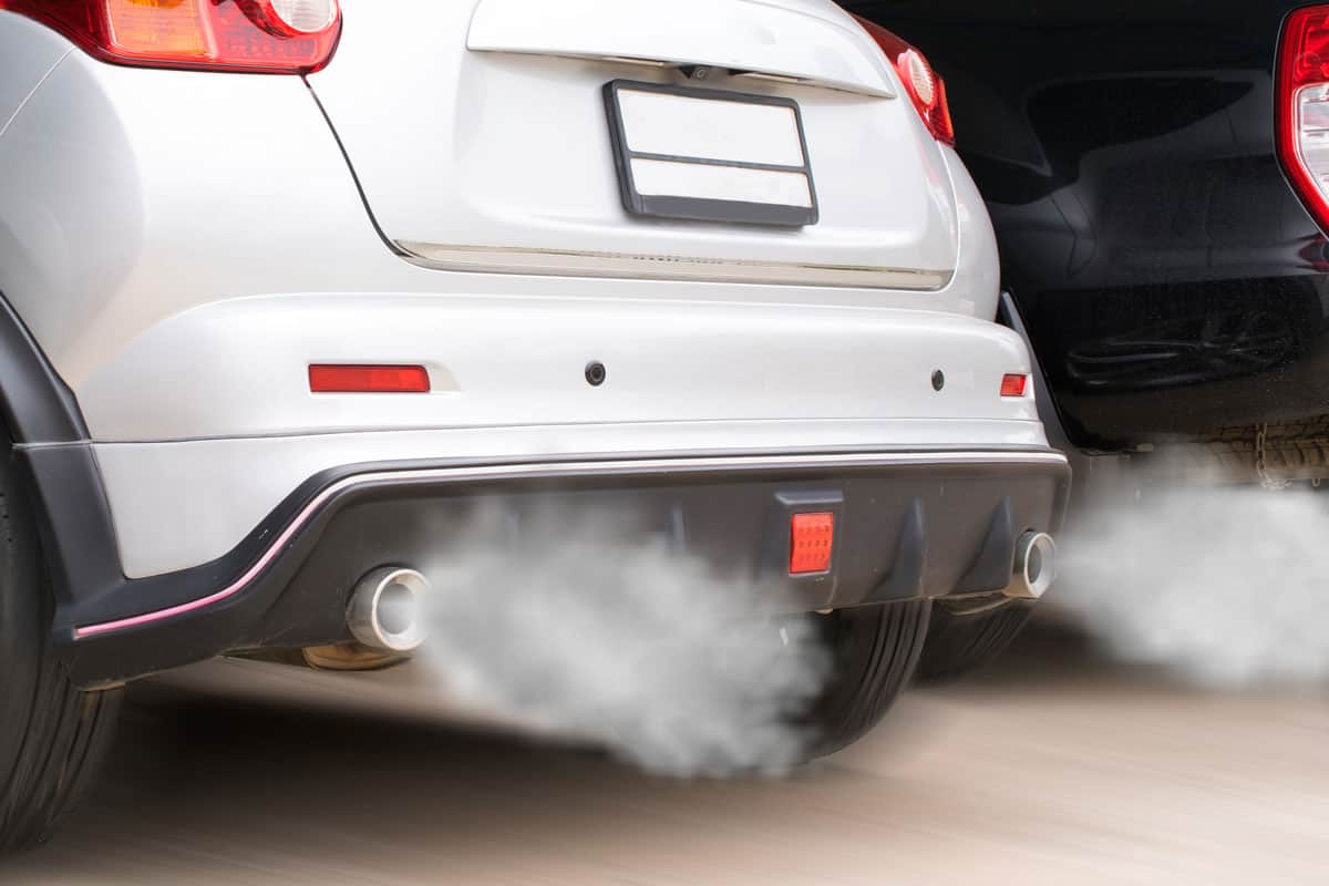 combustion fumes coming out car exhaust