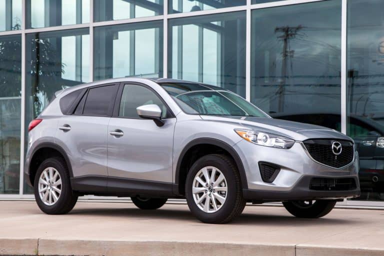 A 2014 Mazda CX-5 on display at a car dealership, Can A Mazda CX-5 Tow A Trailer?
