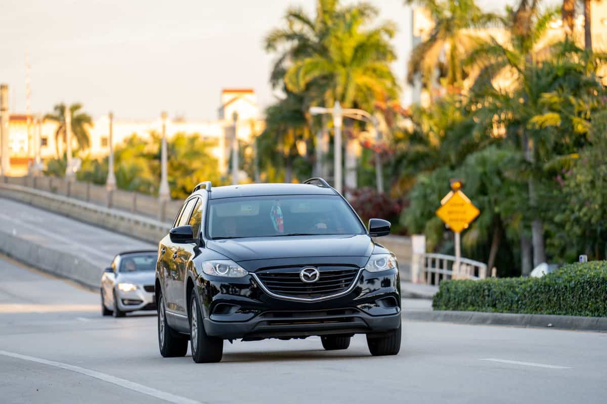 A 2021 Black Mazda CX-9 at the highway