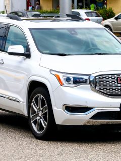 A GMC Acadia parked on the busy streets of the city, What Should The Tire Pressure Be On A GMC Acadia?