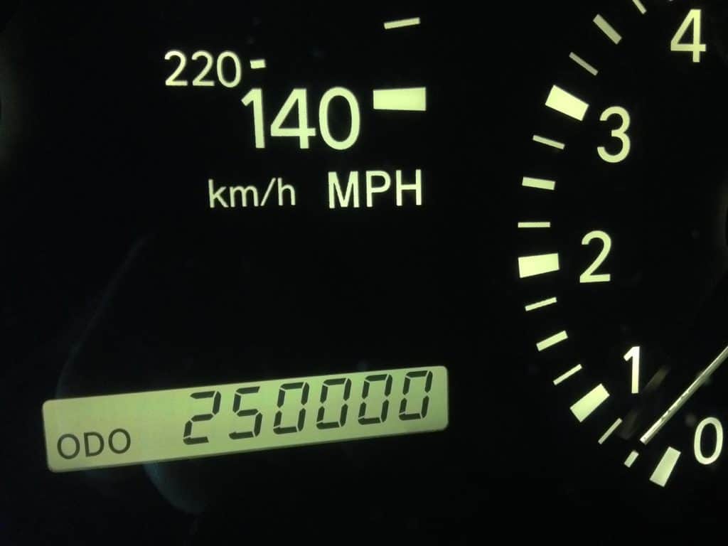 A car's odometer displays 2,500,000, or a quarter-million-miles