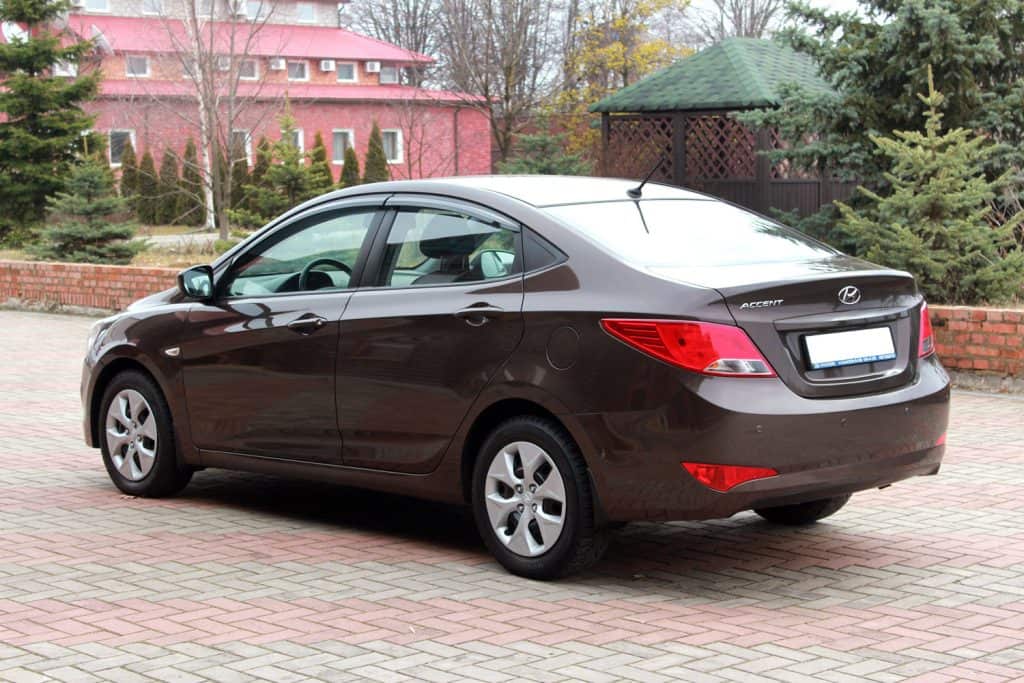  Brown Hyundai Accent 2016 on the parking lot