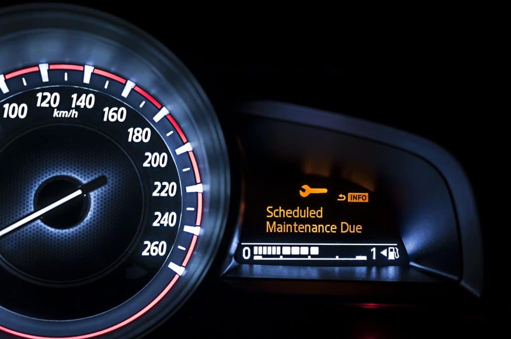 Car speedometer with information display - Scheduled Maintenance Due