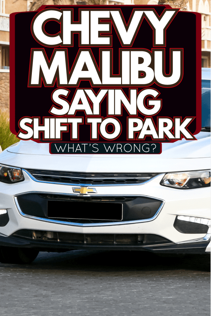 A white colored Chevy Malibu at the highway, Chevy Malibu Saying Shift To Park—What's Wrong?
