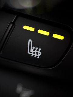 Detail of the heated seats button in a car Can You Add Heated Seats To A Used Car