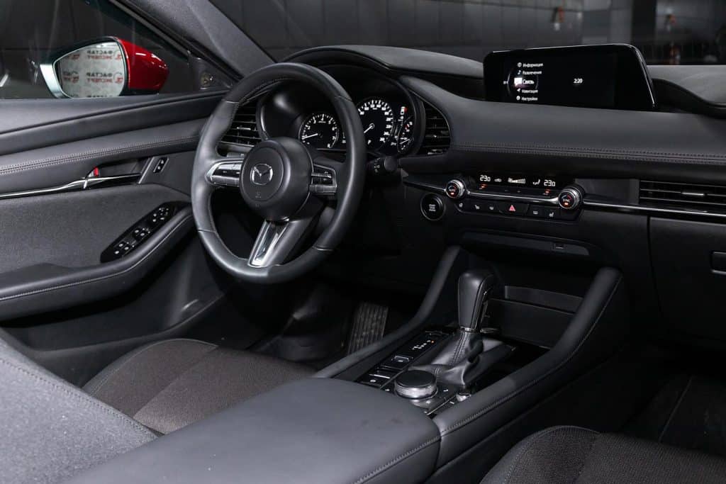Driver seats and dashboard of Mazda 3