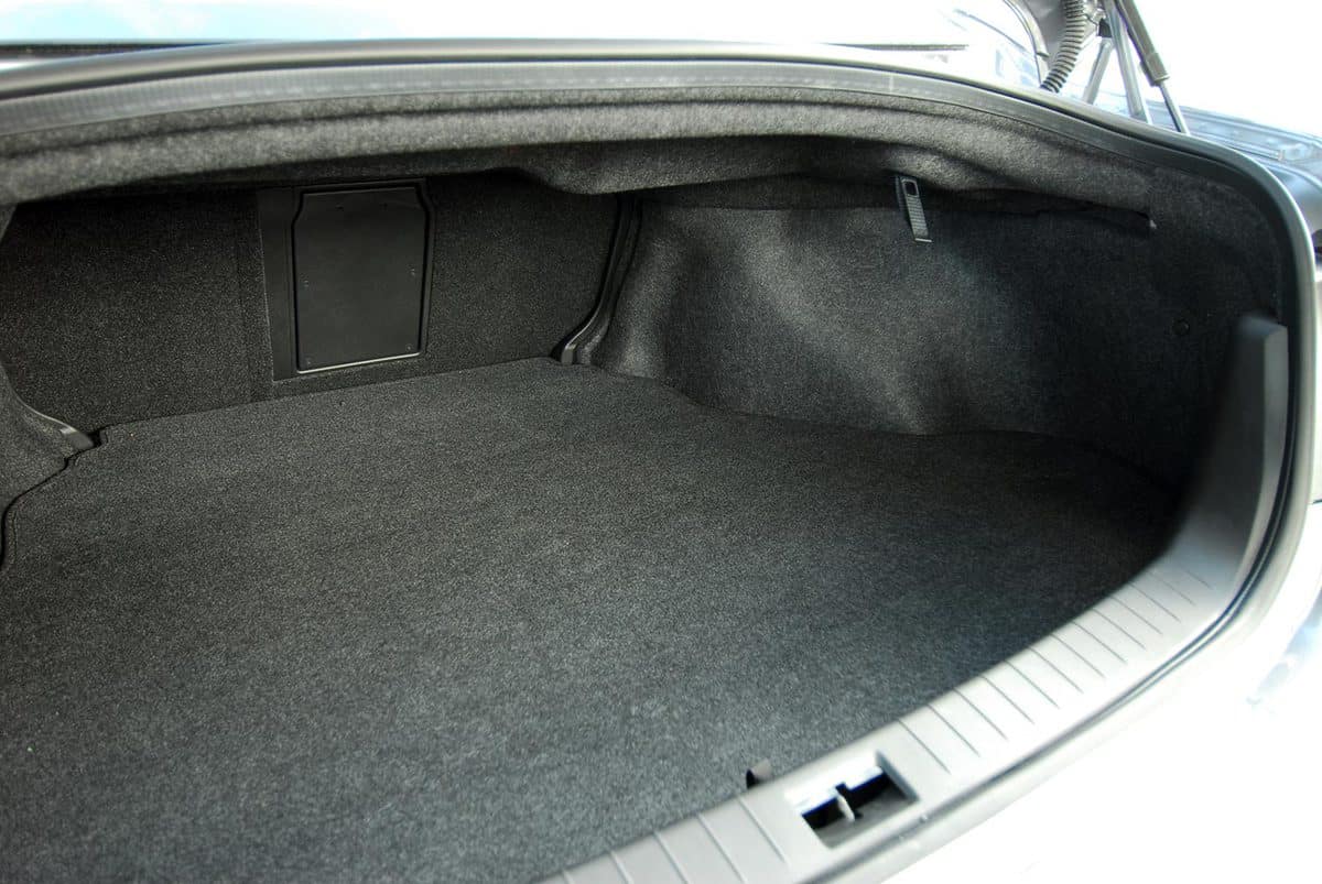 Empty trunk of the large white sedan