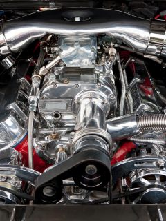 A focus image of a supercharged car engine, Can You Turbo Or Supercharge A Nissan Maxima?