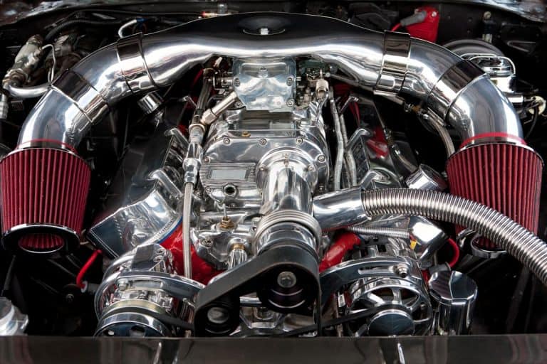 A focus image of a supercharged car engine, Can You Turbo Or Supercharge A Nissan Maxima?