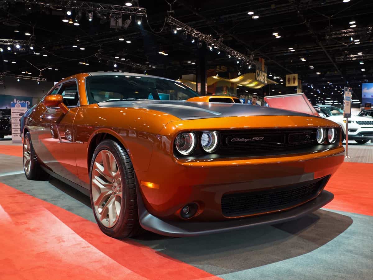 Front view of an orange Dodge Challenger displayed